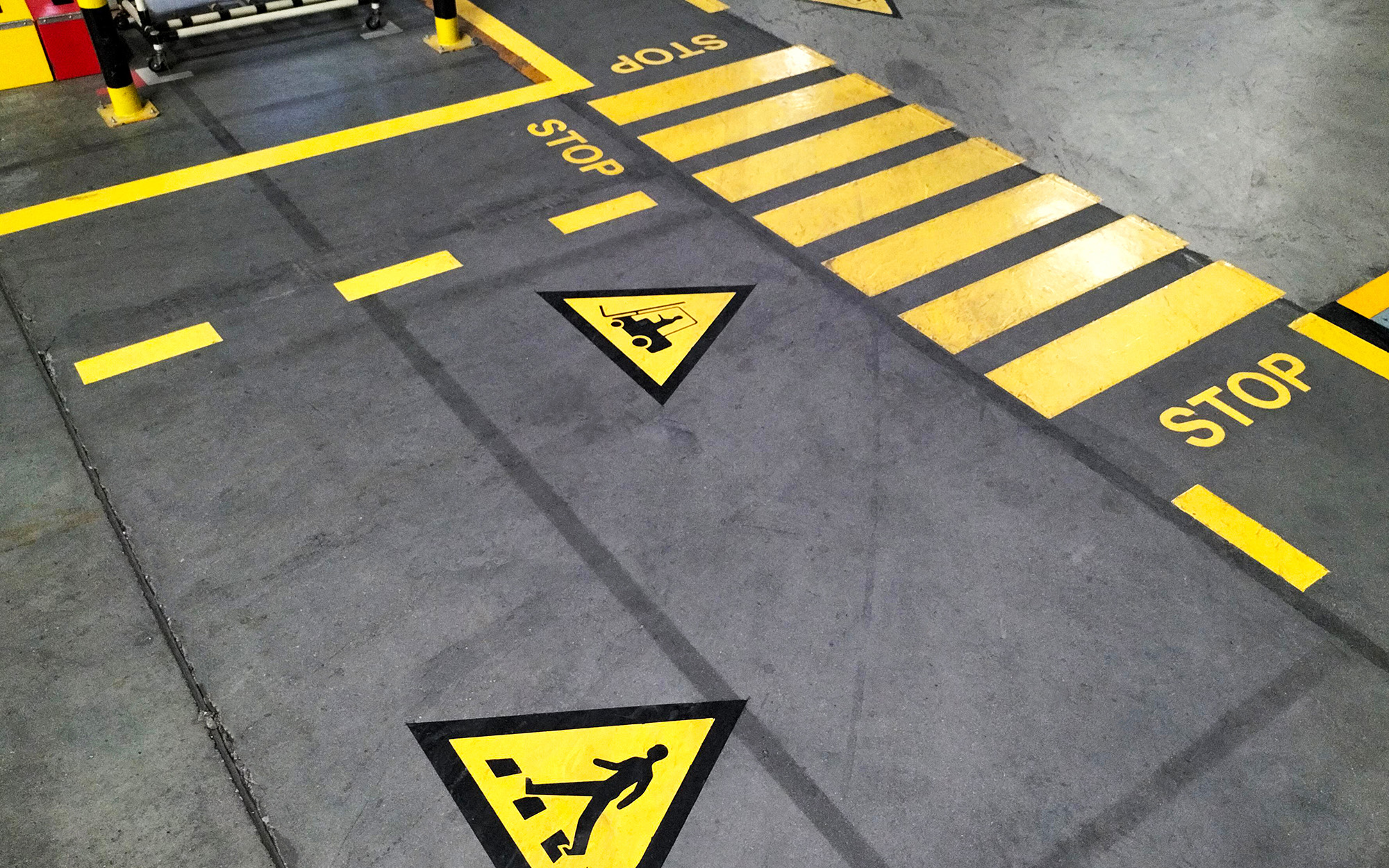 Industrial building corridor painted yellow between parallel yellow lines Industrial Building Corridor Painted Yellow Between Parallel Yellow Lines